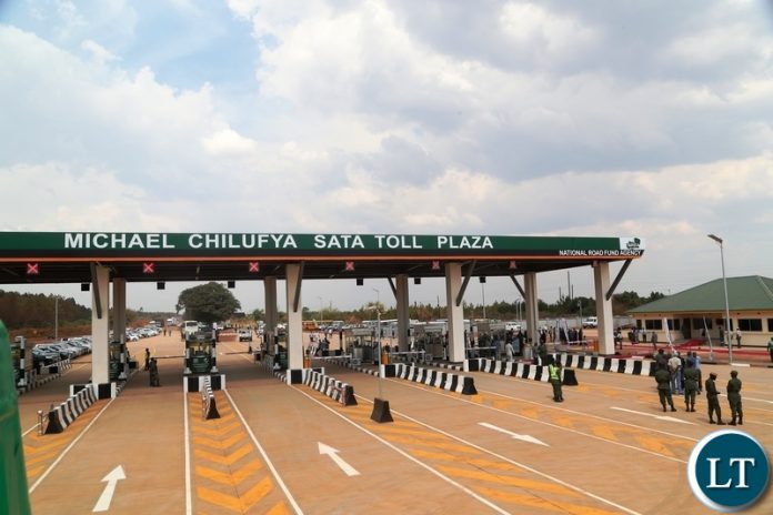 President Edgar Lungu serving a motorist at the newly commissioned Michael Chilufya Toll Plaza on Sunday, 4th November, 2018, Picture by Eddie Mwanaleza. President Edgar Lungu serving a motorist at the newly commissioned Michael Chilufya Toll Plaza on Sunday, 4th November, 2018, Picture by Eddie Mwanaleza.