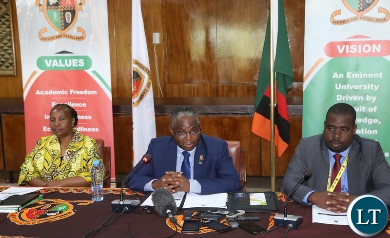 UNZA Vice Chancellor Luke Mumba flanked by Deputy Vice Chancellor Enala Mwase (l) and UNZA Registrar Wamundila Sitali speaking during media brief at UNZA
