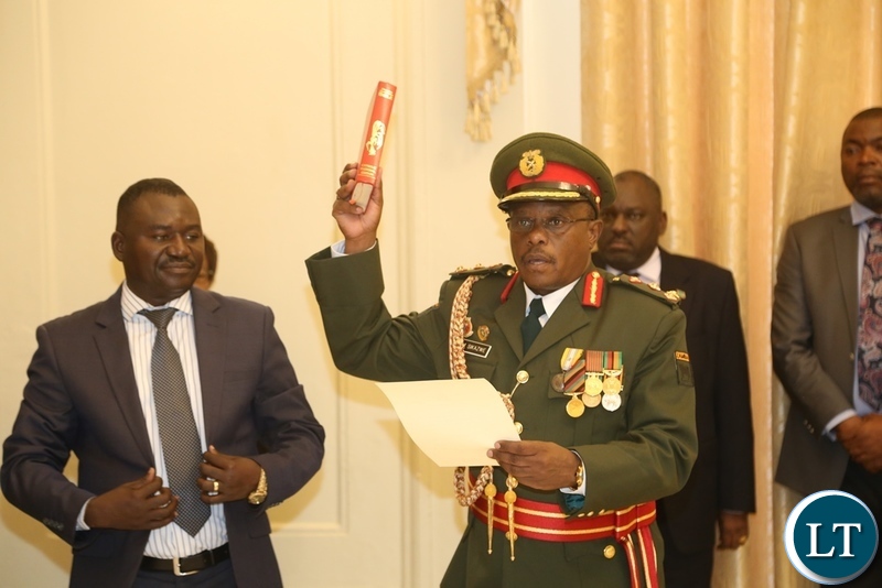 Newly appointed Zambia Army Commander Lt. Gen. William Sikazye taking Oath before President Edgar Lungu at State House