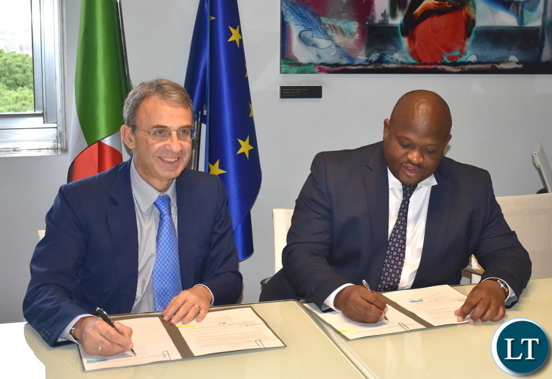 Minister of National Development Planning Alexander Chiteme and Italian Minister of Environment, Land and Sea Sergio Costa signing a Memorandum of Understanding on combating Climate Change on 30 November 2018 in Rome Italy. Photo | Chibaula D. Silwamba | MNDP