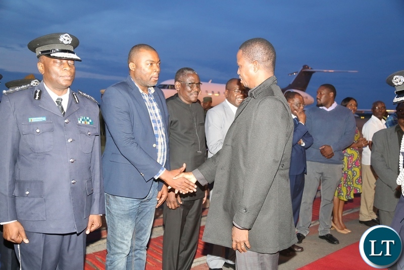 President Edgar Lungu being welcomed by Lusaka Province Minister Bowman Lusambo on his arrival at Kenneth Kaunda International Airport from Japan state visit