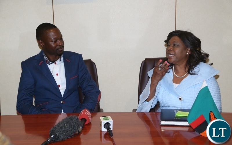 Minister of Religious Affairs Godfridah Sumaili confers with Prophet Emmanuel Makandiwa when he called on the Minister at Government Complex