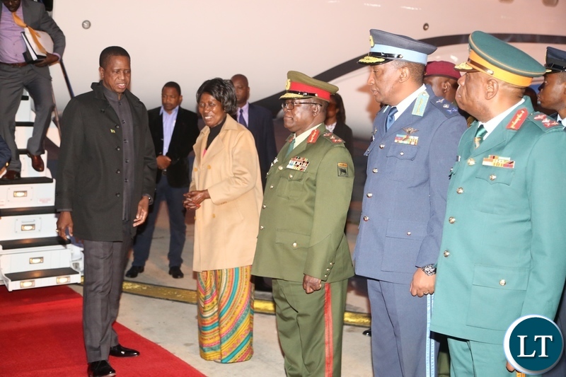 President Edgar Lungu being welcomed by Vice President Inonge Wina and Service Chiefs on his arrival at Kenneth Kaunda International Airport from Japan state