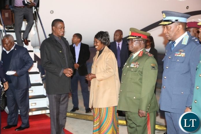 President Edgar Lungu having a light moment with Vice President Inonge Wina on his arrival at Kenneth Kaunda International Airport from Japan state visit President Edgar Lungu having a light moment with Vice President Inonge Wina on his arrival at Kenneth Kaunda International Airport from Japan state visit