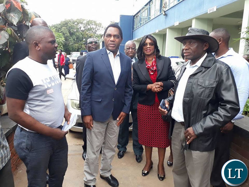 Mr Hichilema with other opposition figures at Lusaka Central Police.