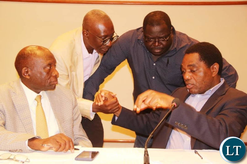 NAREP’s Elias Chipimo, NDC Consultant Chishimba Kambwili and ADD Charles Milupi listen to UPND leader Hakainde Hichilema during a news briefing at Pamodzi Hotel on Sunday