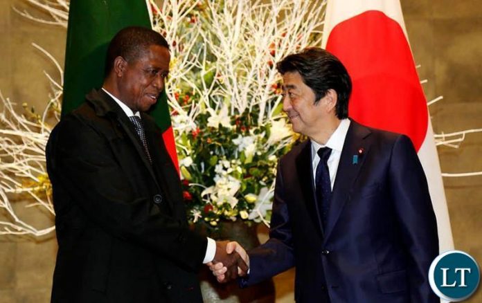 President Edgar Chagwa Lungu (left) being welcomed by Japanese Prime Minister Shinzo Abe at his residence in Tokyo,Japan on Wednesday,December 19,2018. PICTURE BY SALIM HENRY/STATE HOUSE ©2018