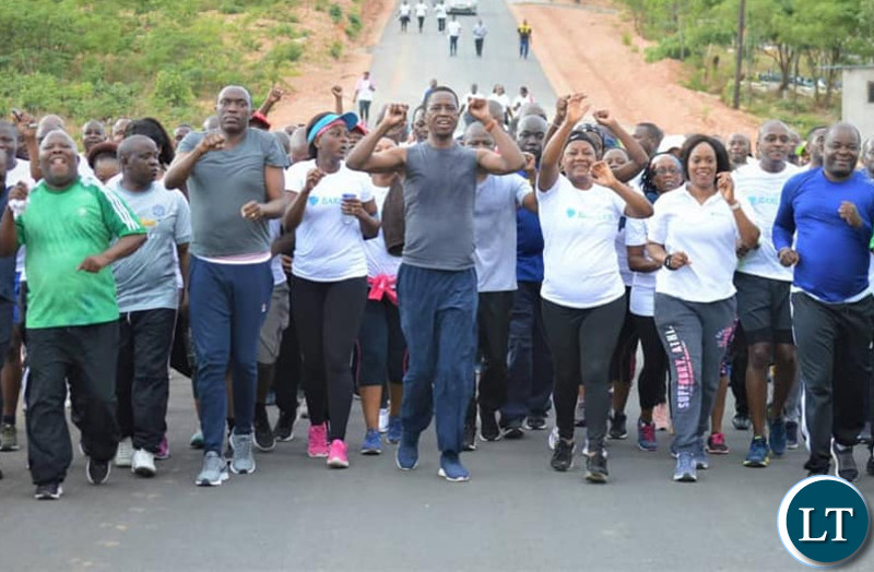 President Edgar Chagwa Lungu leads the fitness way President Edgar Lungu is joined by a team from Barclays Bank Zambia during his routine early morning run and exercises at State Lodge in Lusaka this morning.