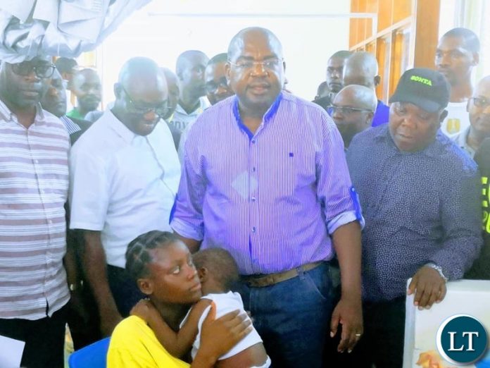 Minister of Health Chitalu Chilufya who was accompanied by Presidential Affairs Minister Freedom Sikazwe and Chipata Central Member of Parliament Moses Mawere and the the boy’s mother, 19 year old Rosemary Jere Minister of Health Chitalu Chilufya who was accompanied by Presidential Affairs Minister Freedom Sikazwe and Chipata Central Member of Parliament Moses Mawere and the the boy’s mother, 19 year old Rosemary Jere