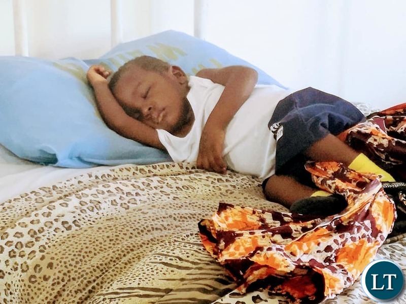 The three year old boy with 44 needles and wires embedded in his body lying in hospital bed