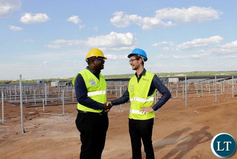 IDC Group CEO Mr Mateyo Kaluba inspecting the Solar Energy Plant
