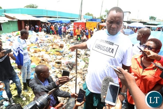 Lusaka Mayor Miles Sampa showing journalists the uncollected waste and blame his offices for not collecting the waste when they are given everything needed to keep the waste out off Central Business District