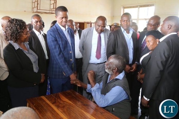 President Edgar Lungu interacts a patients Edson Ngoma Chainama Mental Hospital during the tour of the facility