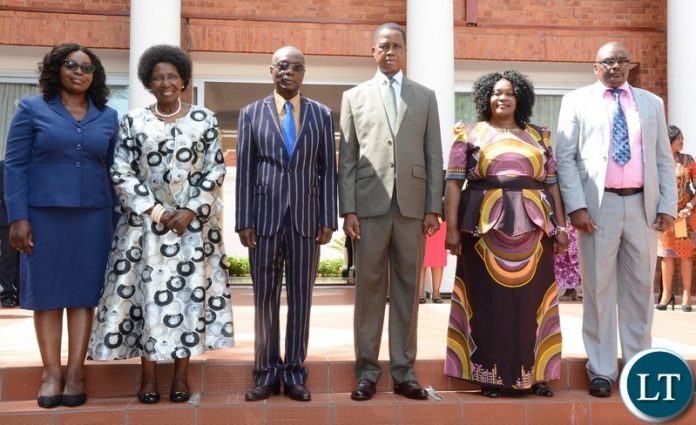 President Edgar Lungu and Vice President Inonge Wina (2nl) the Newly Appointed Permanent Secretaries, Newly Appointed Permanent Secretary Ministry of Health Kakulubelwe Caroline (l),Newly Appointed Permanent Secretary North Western Willies Mangimela (third from Left) Newly Appointed Permanent Secretary Central Province Bernard Chomba (r) and Newly Appointed Permanent Secretary Muchinga Province Joyce Nsamba (2nr) take official photo shortly after Swearing in Ceremony at State House President Edgar Lungu and Vice President Inonge Wina (2nl) the Newly Appointed Permanent Secretaries, Newly Appointed Permanent Secretary Ministry of Health Kakulubelwe Caroline (l),Newly Appointed Permanent Secretary North Western Willies Mangimela (third from Left) Newly Appointed Permanent Secretary Central Province Bernard Chomba (r) and Newly Appointed Permanent Secretary Muchinga Province Joyce Nsamba (2nr) take official photo shortly after Swearing in Ceremony at State House
