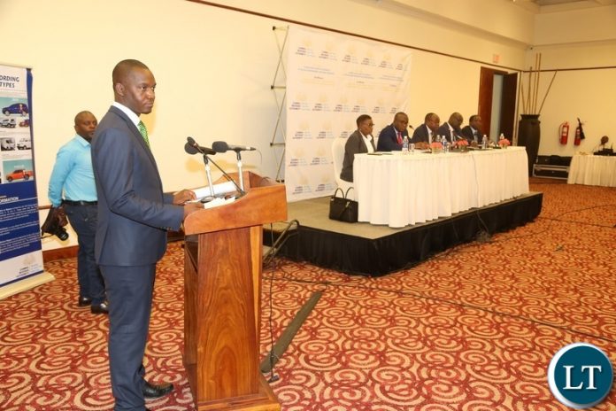 Topsy Sikalinda taking question from journalists during the press conference at Pamodzi Hotel