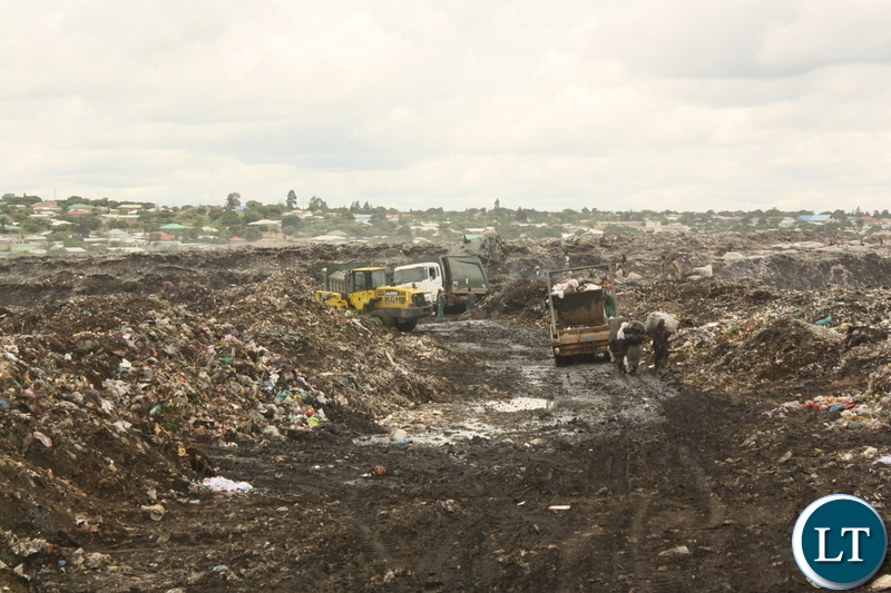 Garbage trucks off-loading solid waste at the Chunga landfill on Thursday, 10th December, 2019 following clearing of the passage within the landfill which is the main dumping site in Lusaka. – Picture by Barnabas Zulu