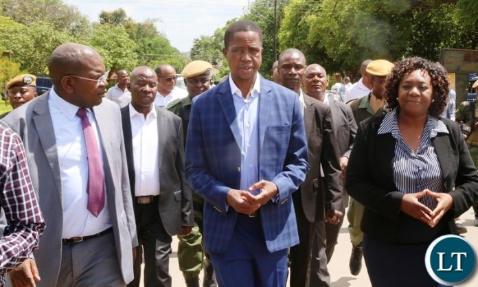 President Edgar Lungu confers with Minister of Health Chitalu Chilufya (l) Chainama Mental Hospital Senior Medical Superintendent Dr. Margaret Chibowa (r) during the tour of the Hospital