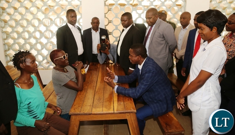 President Edgar Lungu interacts with the patients at being shown around the Chainama Mental Hospital during the tour of the facility