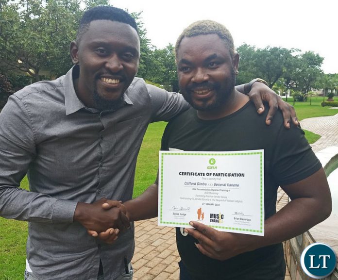 General Kanene poses for a photo with B-Flow after the end of a training in gender mainstreaming