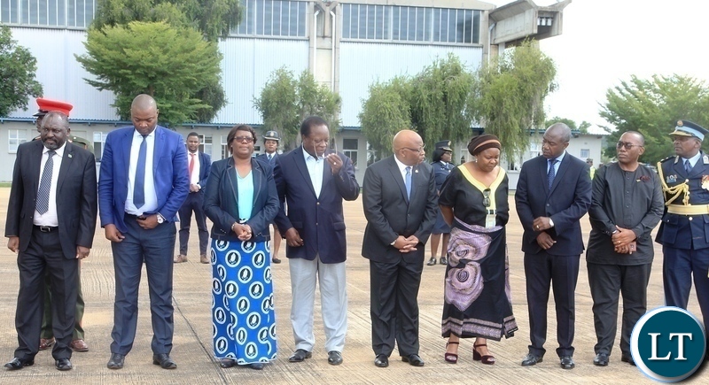 Government ministers and former vice presidents wait to receive the body of former vice president Lupando Mwape from south africa at Zambia Airforce Base in Lusaka
