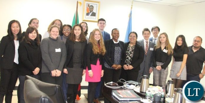 Zambia’s Deputy Permanent Representative to the United Nations (UN), Ms Christine Kalamwina (centre), with students from Columbia University’s International Relations Council and Association during their visit to the Zambia Mission under the Columbia Model United Nations Conference and Exposition (CMUNCE) Diplomatic Visit Program last week. Picture by WALLEN SIMWAKA/ZAMBIA MISSION Zambia’s Deputy Permanent Representative to the United Nations (UN), Ms Christine Kalamwina (centre), with students from Columbia University’s International Relations Council and Association during their visit to the Zambia Mission under the Columbia Model United Nations Conference and Exposition (CMUNCE) Diplomatic Visit Program last week. Picture by WALLEN SIMWAKA/ZAMBIA MISSION
