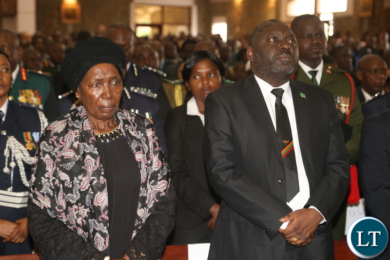Acting President Inonge Wina with Minister of Defence Davies Chama at the Cathedral Child Jesus during the funeral church service of the late Maj. Gen. Kapotwe Chintu