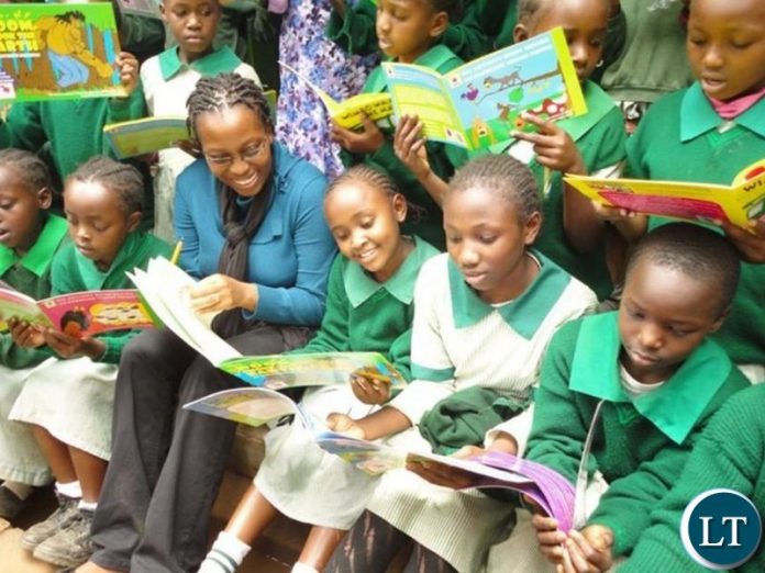 Kawangware Primary School with books donated from the Start A Library Project-FILE