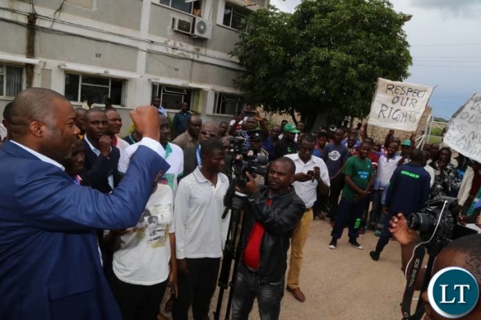 Lusaka Province Minister Bowman Lusambo addressing aggrieved workers at Eva Products over a labour dispute Lusaka Province Minister Bowman Lusambo addressing aggrieved workers at Eva Products over a labour dispute