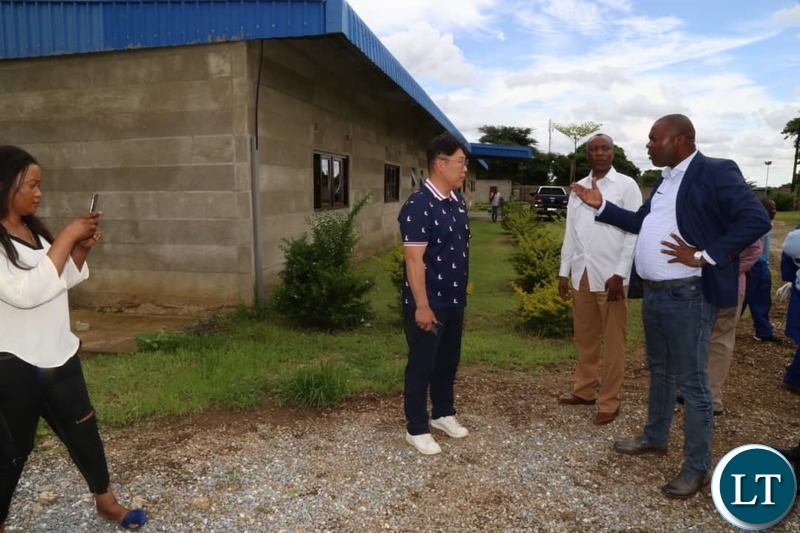 Lusaka Province Minister Bowman Lusambo takes a Mr Kin, the Director of Eva Products to task after aggrieved workers petitioned his office over a labour dispute
