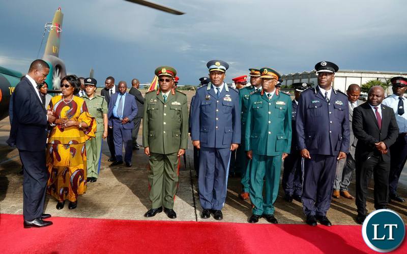 President Edgar Chagwa Lungu (left) talks to Vice-President before departure for South Africa at Zambia Air Force Base in Lusaka on Tuesday,January 8,2019. PICTURE BY SALIM HENRY/STATE HOUSE ©2019
