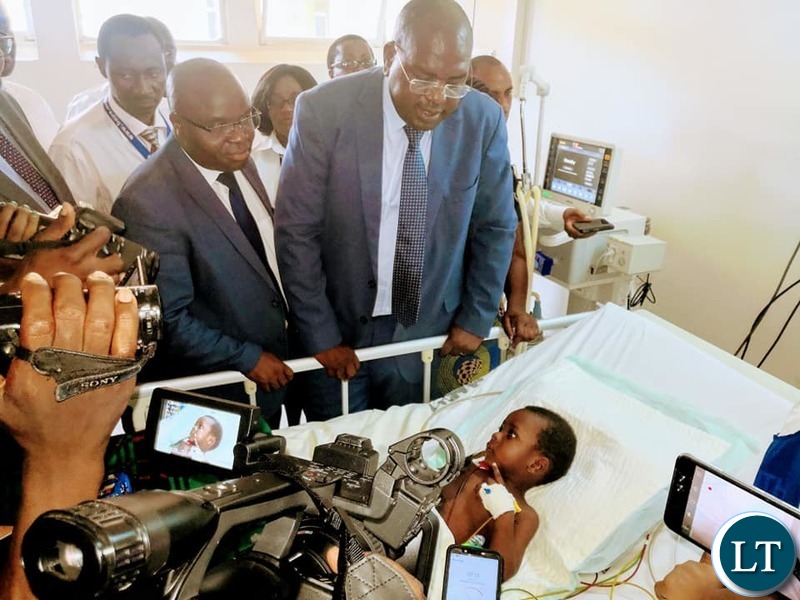 Minister of Health Dr. Chitalu Chilufya visiting the recovering Richard Zulu
