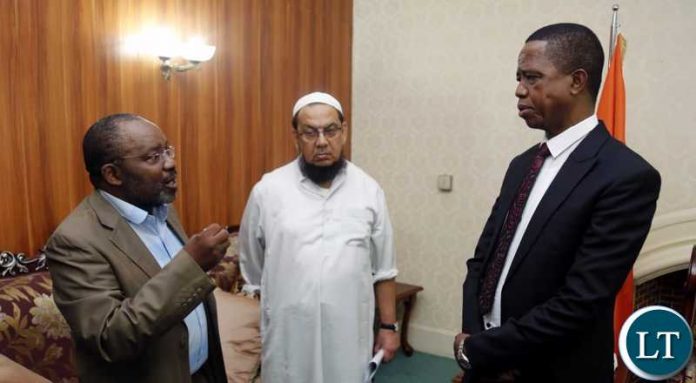 President Edgar Chagwa Lungu (right) listens to Trade Kings) Spokesperson Eng. Ernest Mande (left). On the middle is Trade Kings Chief Executive Officer (C.E.O) Iqbal Patel (centre) at State House in Lusaka on Friday,January 25, 2019 when Trade Kings paid a courtesy call on the President to brief him him on the Trade Kings expansion projects. PICTURE BY SALIM HENRY/STATE HOUSE ©2019