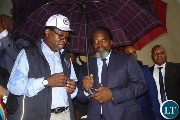 Head of the SADC Observer Mission in the Democratic Republic of Congo, and Zambia's Minister of Forrign Affairs Hon. Joseph Malanji led a team to observe the casting of votes. Head of the SADC Observer Mission in the Democratic Republic of Congo, and Zambia's Minister of Forrign Affairs Hon. Joseph Malanji led a team to observe the casting of votes. In the Picture , the Minister with outgoing President Joseph Kabila