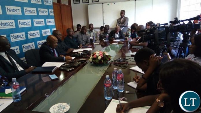 National Water and Sanitation Council Acting Director Eng. Peter Mutale (C) addressing a media briefing National Water and Sanitation Council Acting Director Eng. Peter Mutale (C) addressing a media briefing