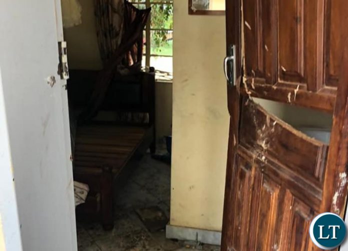 The Broken door of the Guest House where PF cadres were residing. Door damaged and forced open by Zambia Police The Broken door of the Guest House where PF cadres were residing. Door damaged and forced open by Zambia Police