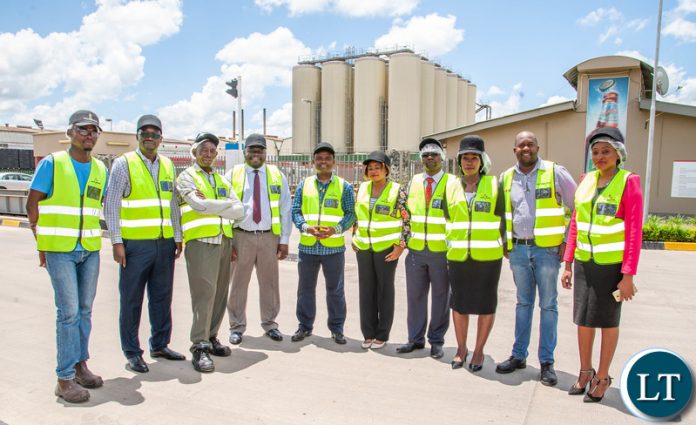 Economics Association of Zambia representatives visit Zambian Breweries' Lusaka plant.