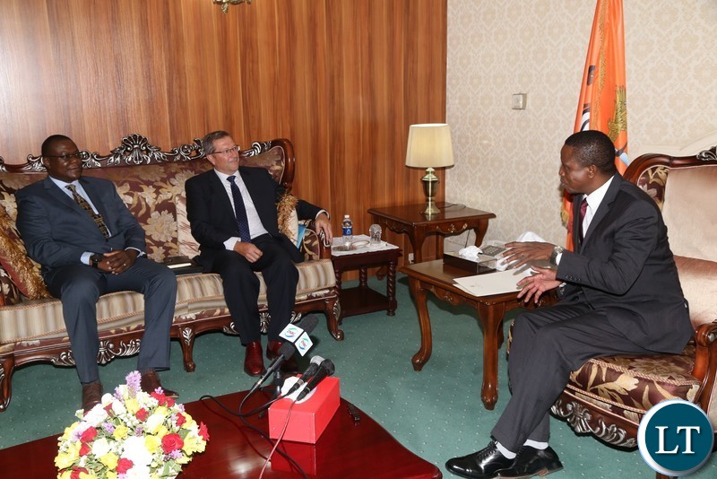President Edgar Lungu talks to Lubambe Mine Chief Executive Officer Nick Bowen(c) when he paid a courtesy call on him at State House