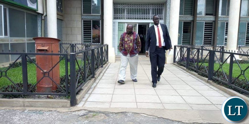 Minister of Infrastructure Ronald Chitotela on Tuesday leaving the ACC Headquarters in the company of his lawyer