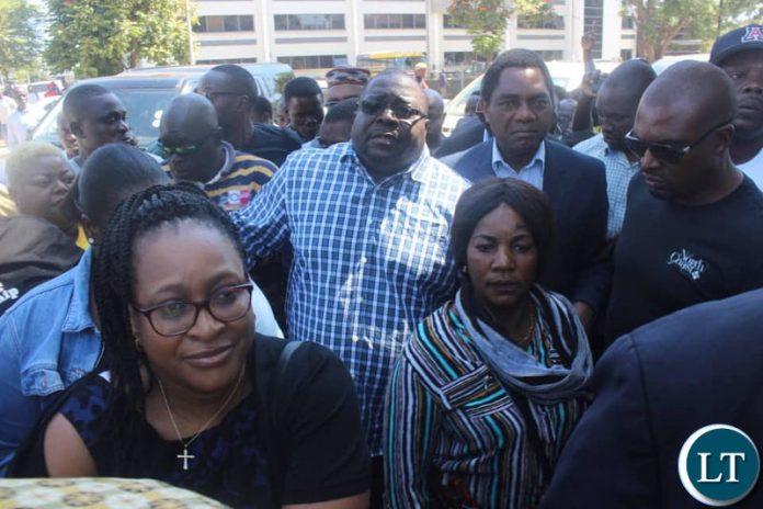 Kambwili with his wife Carol and opposition leaders arriving at Central Police Station.