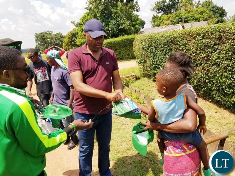 Kabushi Member of Parliament Bowman Lusambo on a Door to Door Campaign in Luanshya distributing campaign materials to voters