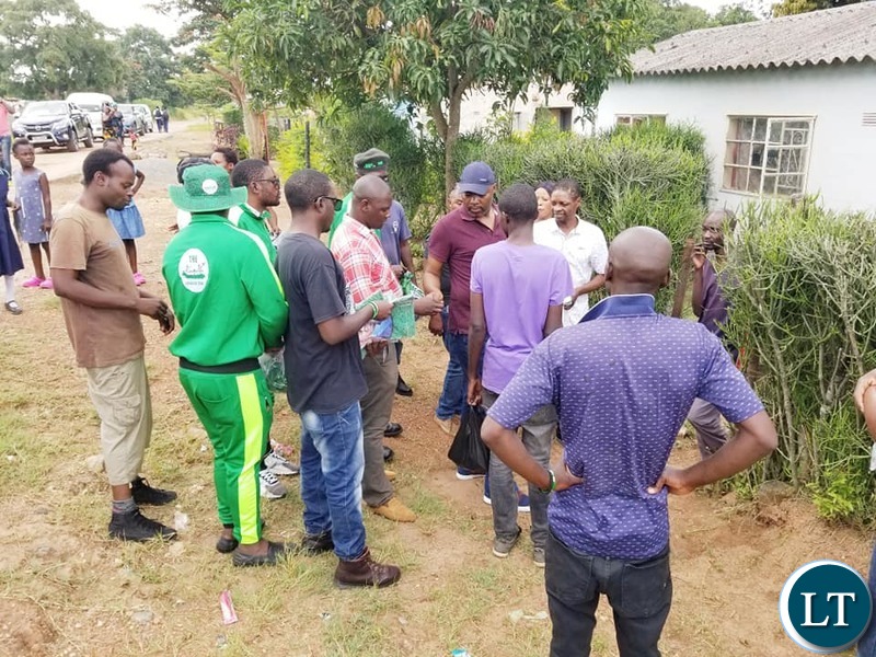 Kabushi Member of Parliament Bowman Lusambo on a Door to Door Campaign in Luanshya distributing campaign materials to voters