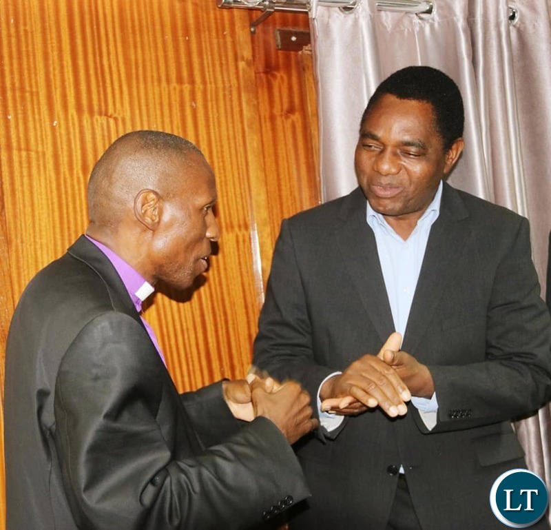 FILE: United Church of Zambia Synod Bishop Sydney Sichilima with UPND leader Hakainde Hichilema during the three Church mother bodies led dialogue meeting at Kapingila house in Lusaka, Zambia