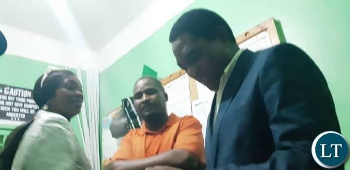 UPND President Hakainde Hichilema and Alliance partners offering solidarity at Lusaka Central police to one of the partners, Sean Tembo who was arrested on a charge of defamation of President.