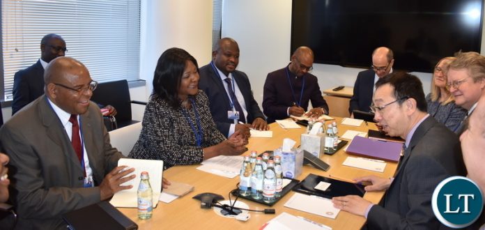 Finance Minister Margaret Mwanakatwe, National Development Planning Minister Alexander Chiteme, Deputy Secretary to the Cabinet – Finance and Economic Development Christopher Mvunga and Bank of Zambia Governor Denny Kalyalya (left) share a light moment with International Monetary Fund (IMF) Deputy Managing Director Tao Zhang during a meeting at IMF HQ in Washington DC USA on Wednesday 10 April 2019. PHOTO | CHIBAULA D. SILWAMBA | MNDP