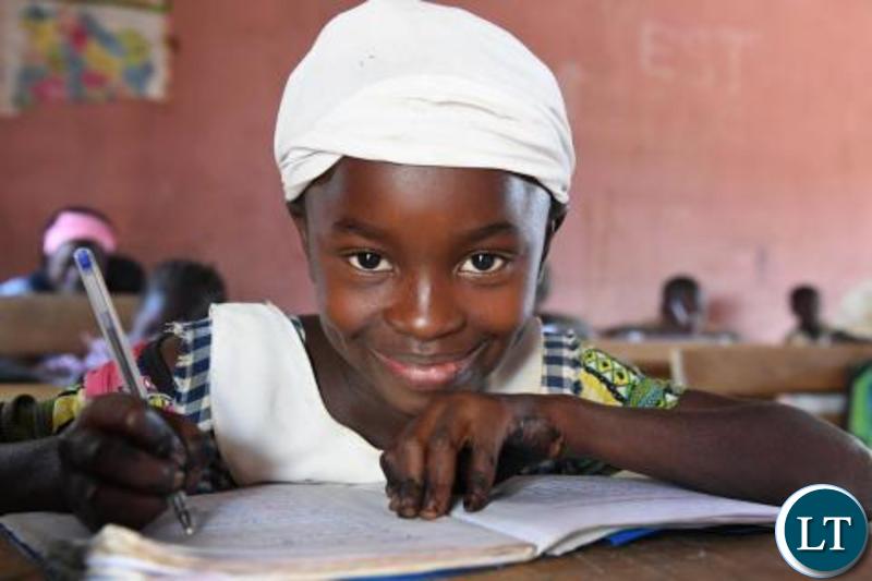 A girl attending class-PIX-UNICEF