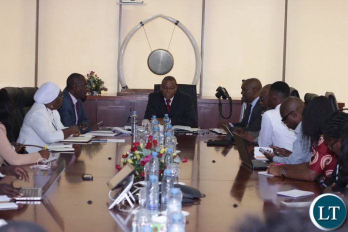 Bank of Zambia Governor Denny Kalyalya addresses a news briefing at the Bank Headquarters in Lusaka
