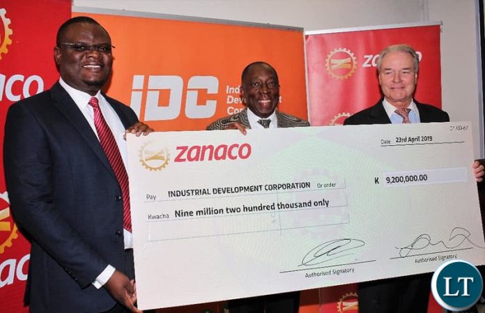 IDC Group CEO Mr Mateyo Kaluba (left), ZANACO Board Vice Chairperson Mr Hastings Mtine and ZANACO CEO Mr Henk Mulder (right) showing the dividend cheque. IDC Group CEO Mr Mateyo Kaluba (left), ZANACO Board Vice Chairperson Mr Hastings Mtine and ZANACO CEO Mr Henk Mulder (right) showing the dividend cheque.