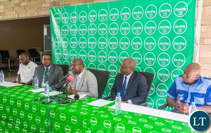 Transport and Communications Minister Brian Mushimba speaking during the launch of the ZamPay Number Neutral Capability at Zamtel House