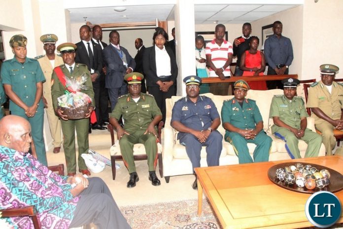Service chiefs representative paying a courtsey visit to Zambia 1st president Kenneth Kaunda.