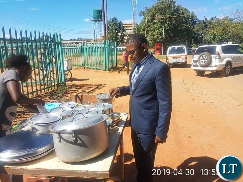 Chilufya Tayali captured buying Nshima from a street vendor in Lusaka